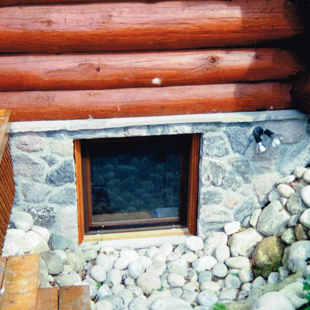 filed stone window well masonry